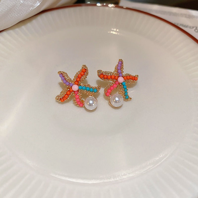 Veile Studios Title
Cute Colourful Starfish Pearl Earrings Simple For Casual And Formal Use