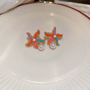 Veile Studios Title
Cute Colourful Starfish Pearl Earrings Simple For Casual And Formal Use