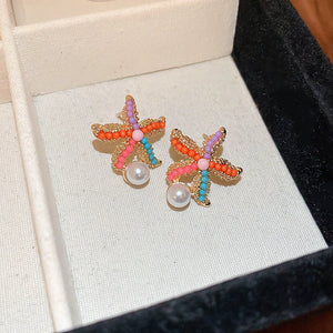 Veile Studios Title
Cute Colourful Starfish Pearl Earrings Simple For Casual And Formal Use