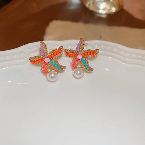 Veile Studios Title
Cute Colourful Starfish Pearl Earrings Simple For Casual And Formal Use