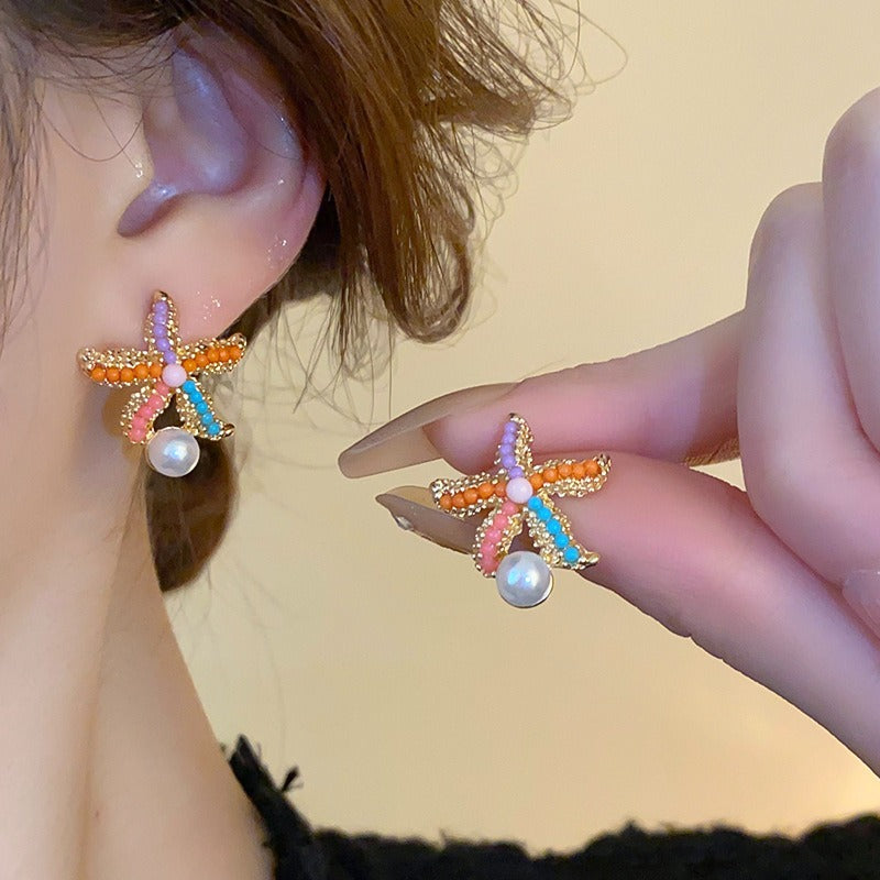 Veile Studios Title
Cute Colourful Starfish Pearl Earrings Simple For Casual And Formal Use