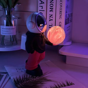 Holding The Dreamy Starry Sky (Black Top + Red Pants) Creative Astronaut Bluetooth Speaker With 3D Lighting Portable Wir