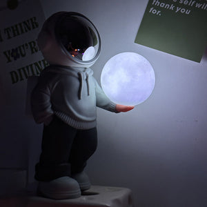 Holding The Romantic Moon (Grey Top + Navy Blue Pants) Creative Astronaut Bluetooth Speaker With 3D Starry Sky Lighting