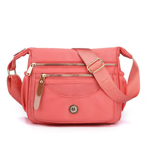 Pink Nylon Crossbody Bag With Multiple Compartments Compact And Stylish Design